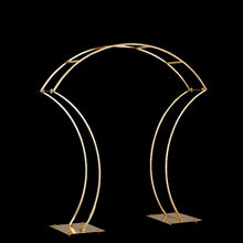 Load image into Gallery viewer, Elegant gold arch centerpiece stand with white floral arrangement creating luxury wedding table display