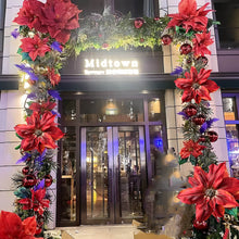 Load image into Gallery viewer, Red poinsettia floral garland for Christmas and New Year storefront display