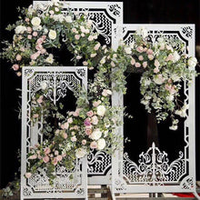 Load image into Gallery viewer, White wedding backdrop stand decorated with floral arrangements for luxury event styling