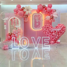 Load image into Gallery viewer, LOVE LED neon sign in warm white light for wedding engagement party decorations and romantic events