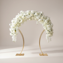 Load image into Gallery viewer, Gold metal arch table centerpiece stand decorated with white flowers for wedding reception decor
