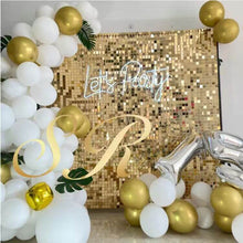 Load image into Gallery viewer, Luxurious gold shimmer wall backdrop for a birthday party
