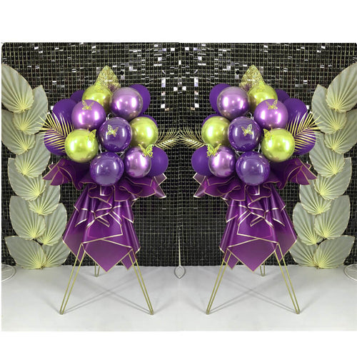Unique balloon stand bouquets for a graduation celebration