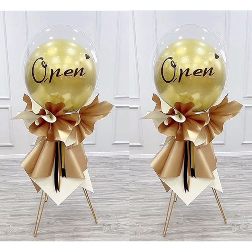 Golden balloon stand for a birthday party