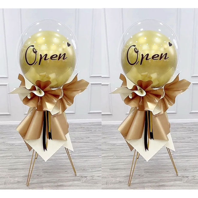 Golden balloon stand for a birthday party