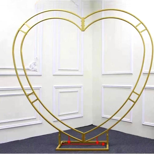 metal heart shaped backdrop for wedding rental 